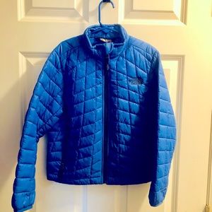 Bright blue Northface kids jacket. Barely worn.  Lightweight and easy to zip.